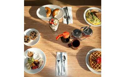 view looking down at breakfast food on restaurant table