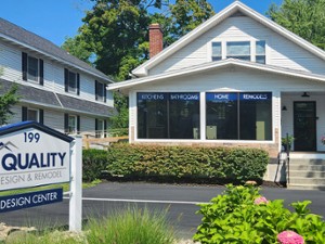 sign for quality design and remodel on a desk