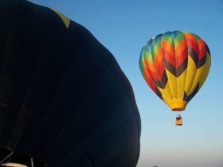 two hot air balloons in flight