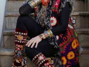 woman wearing an eccentric colorful outfit