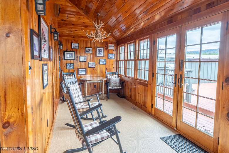 Enclosed porch with lake views