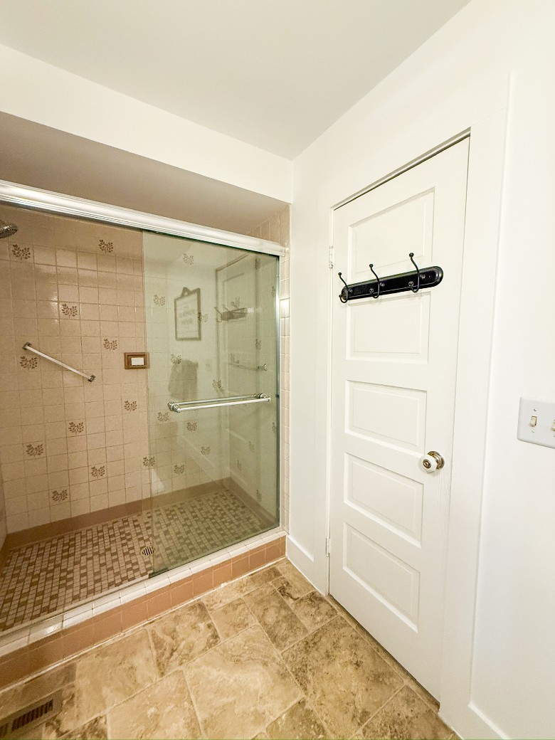 Main level full bathroom with shower