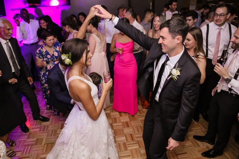 bride and groom dancing
