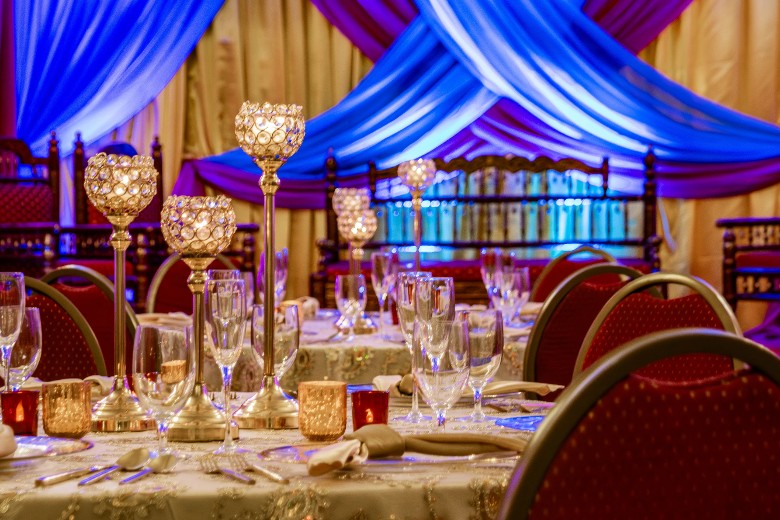 tables set up in wedding reception space