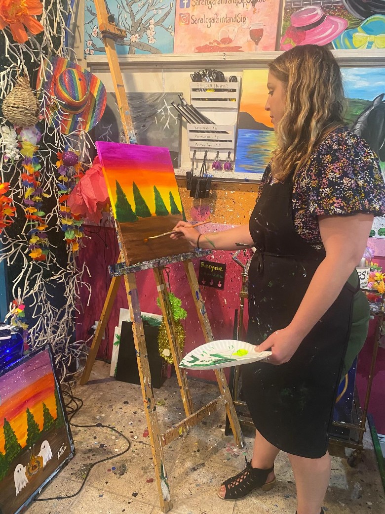 a woman painting