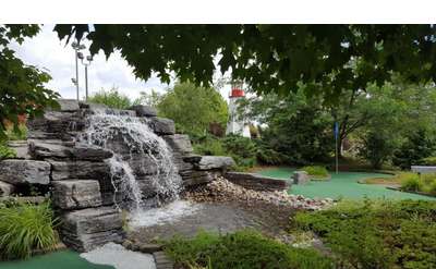 water feature at a mini golf course with a green visible to the right side