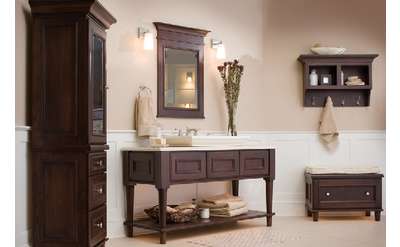 brown cabinet, table, and decor in a room