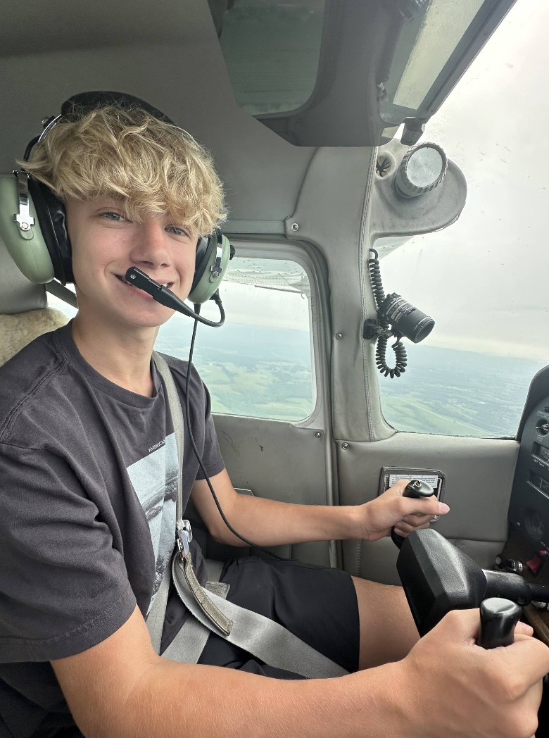 kid flying plane