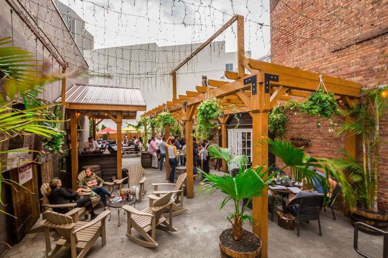 outdoor patio next to a large brick building