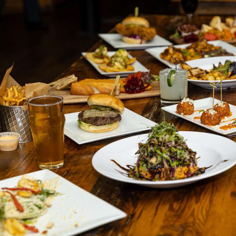 plates of food and beverages on a table