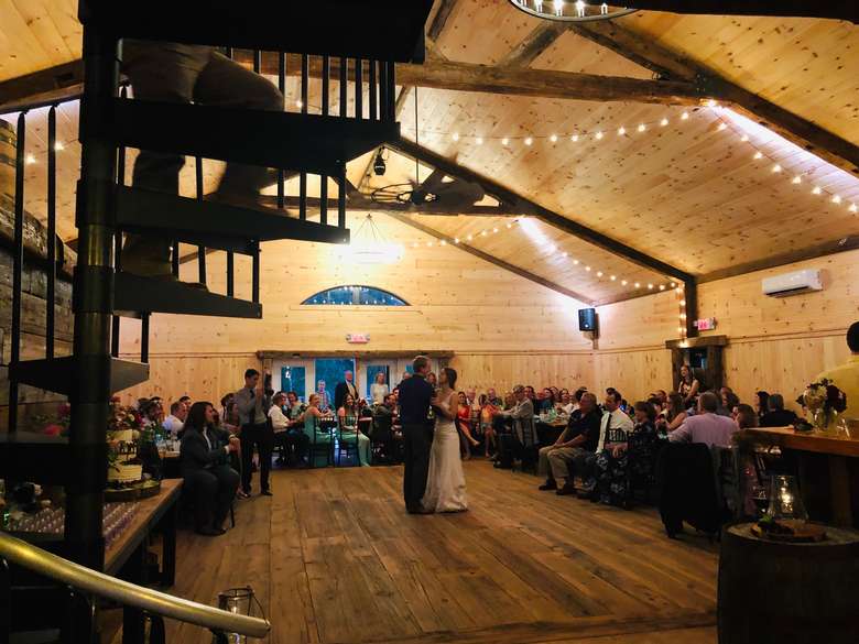 wedding dancers in a rustic barn