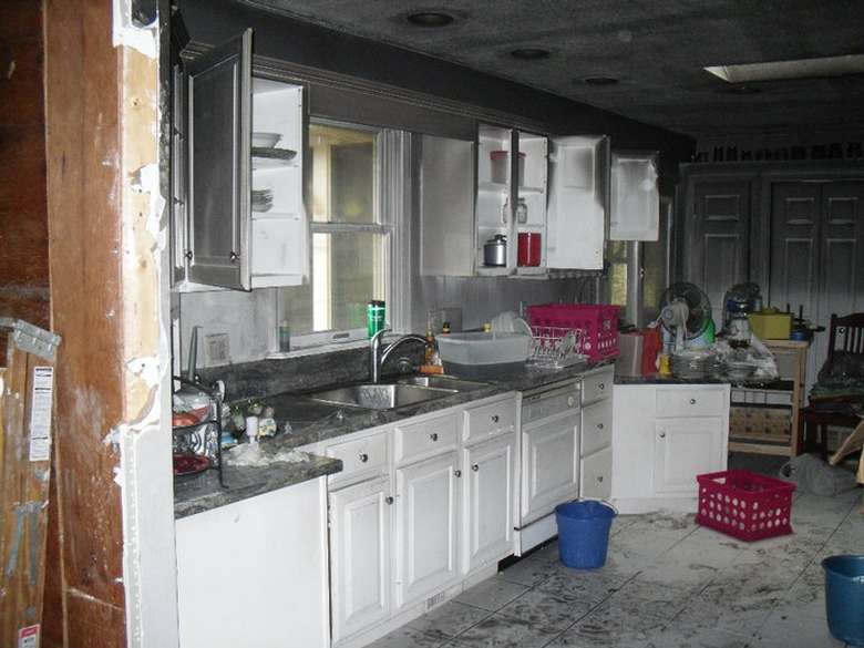a kitchen that experienced fire damage