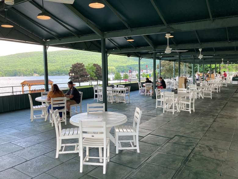 covered patio dining view of the Lookout Cafe with fans over tables