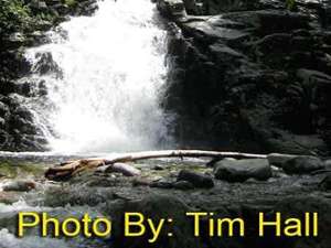 rushing waterfall with photo credit to tim hall