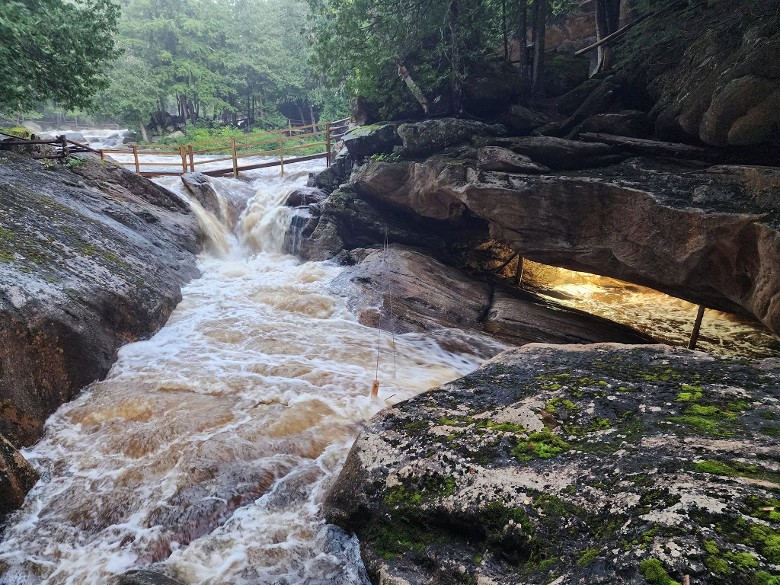natural stone bridge and caves large waterfall