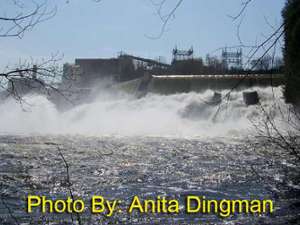water flowing out of a hydroelectric plant with photo credit to anita dingman