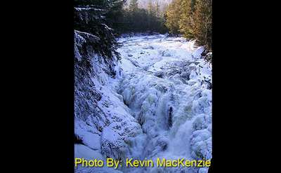 frozen waterfall with photo credit to kevin mackenzie