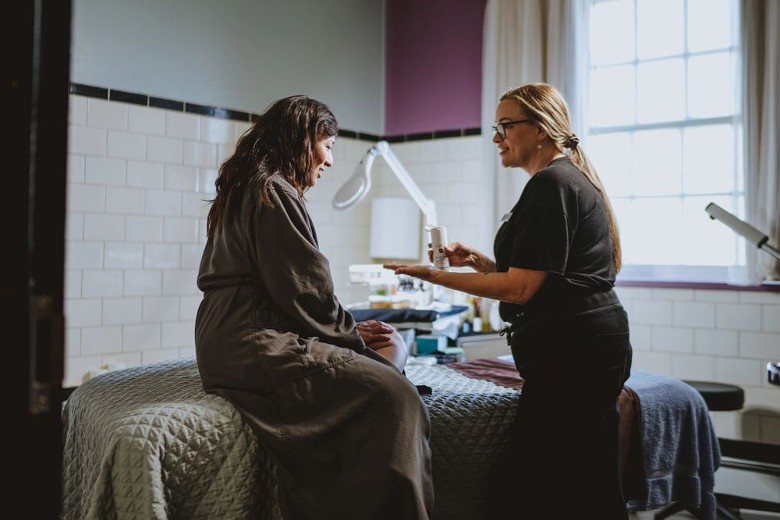 a woman and a massage therapist