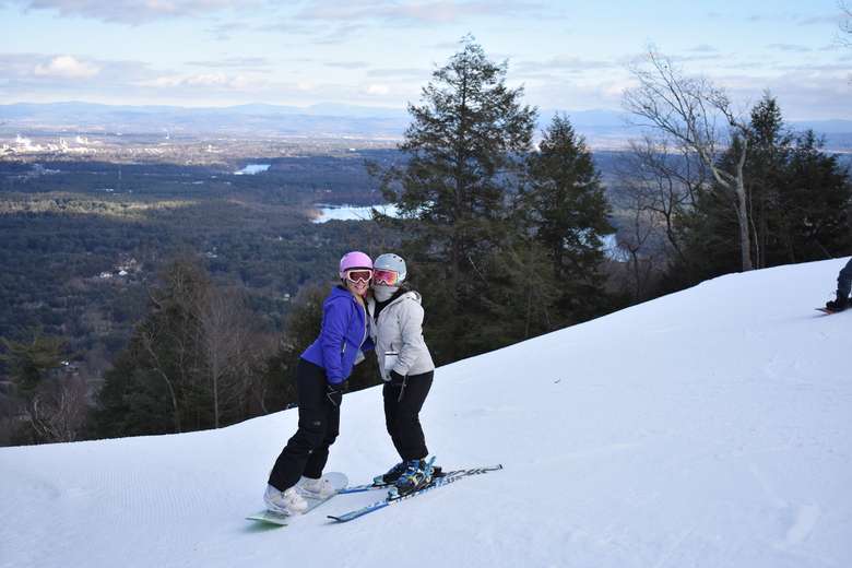 two women on a ski slope