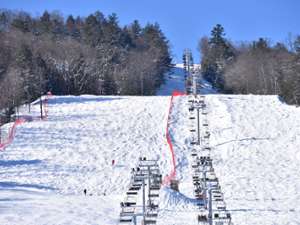 downhill ski slope with chairlift