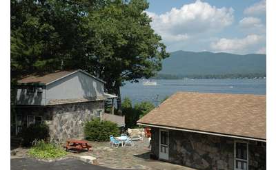 lakefront townhouse buildings overlooking lake george
