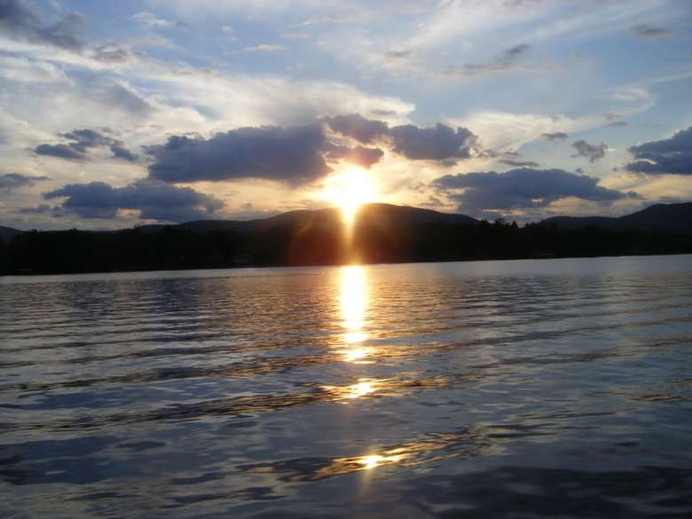 Sunset over Lake George, behind the mountains