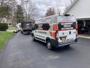 cleanbright surface restoration vehicle outside house