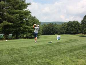 golfer in mid-swing