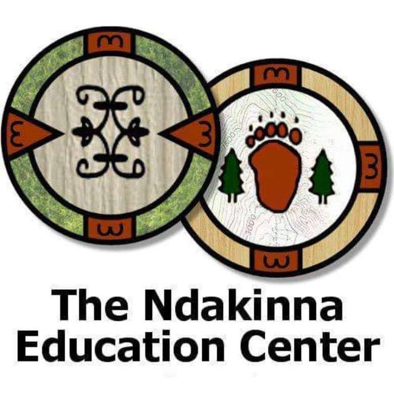 the logo for the ndakinna education center