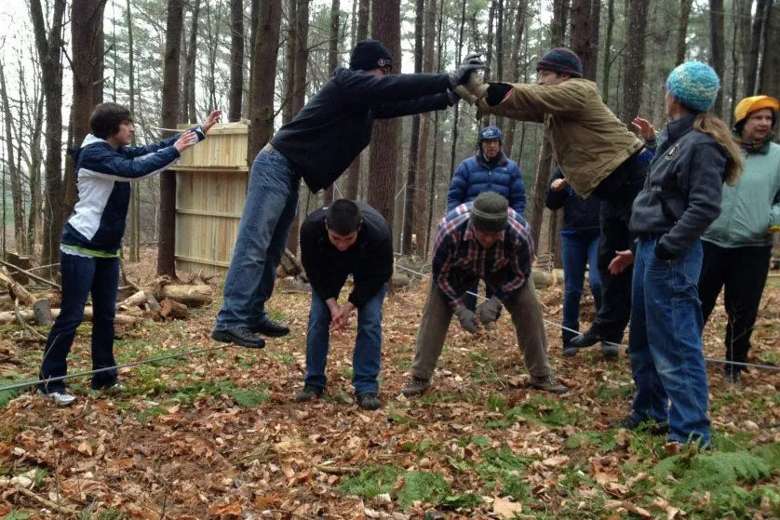 people doing an exercise together outdoors