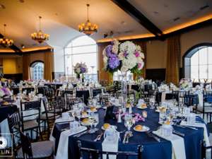 a dining area set up for a wedding