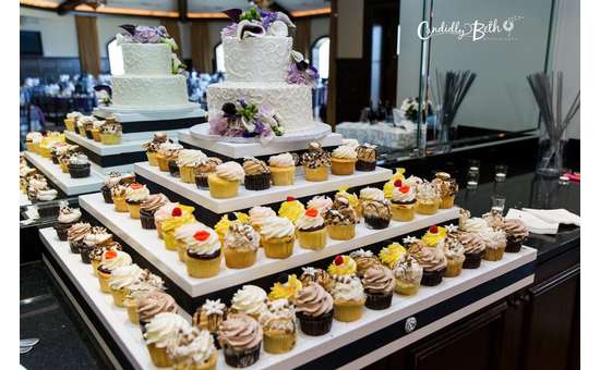 an attractive arrangement of cupcakes