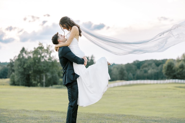 a couple on the golf course at Saratoga National
