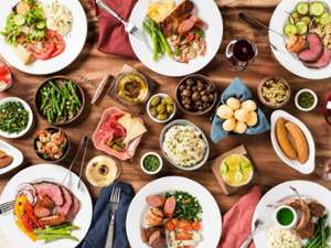 overhead shot of plates of food on a table