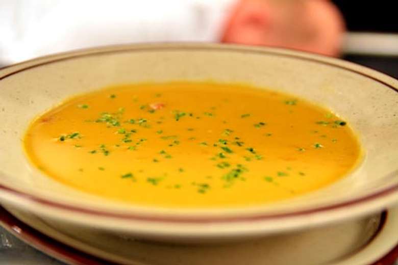 orange soup in a bowl