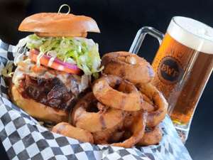 burger, onion rings, and beer