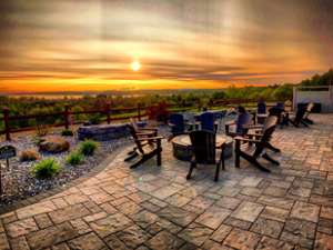 beautiful gold and orange sunset viewed from large outdoor patio