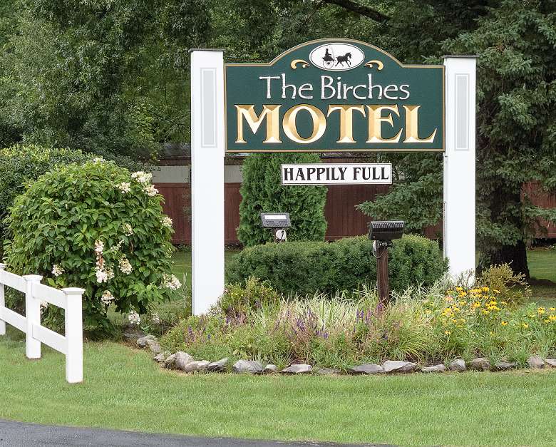 the birches motel sign
