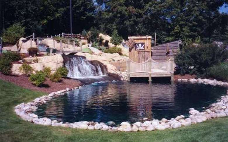 A waterfall draining into a pond at Pirate's Cove