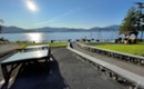 Enjoy lakeside ping pong, swings, relaxing gazebo