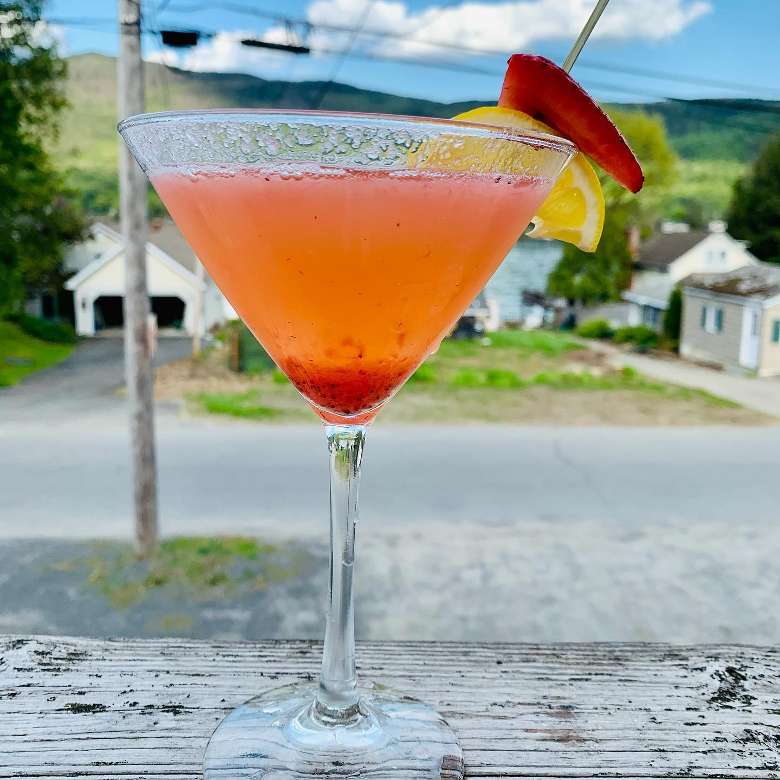 pink cocktail on patio