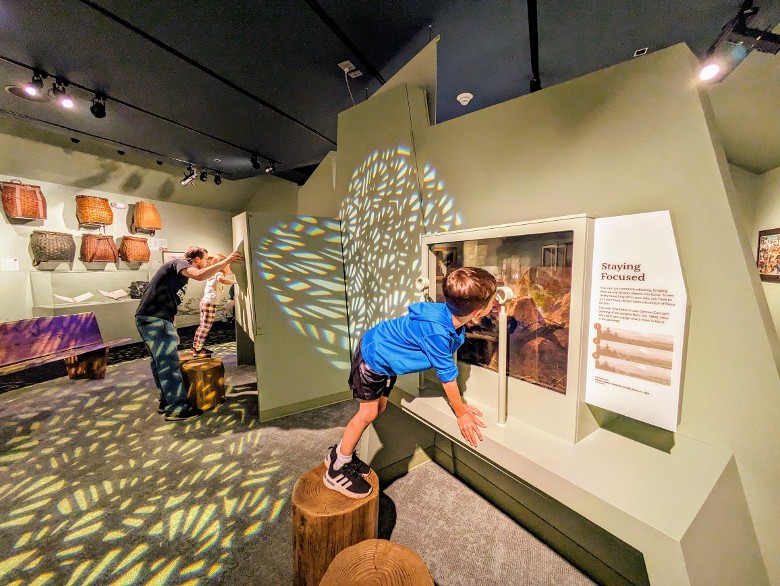 kids look inside interactive exhibits