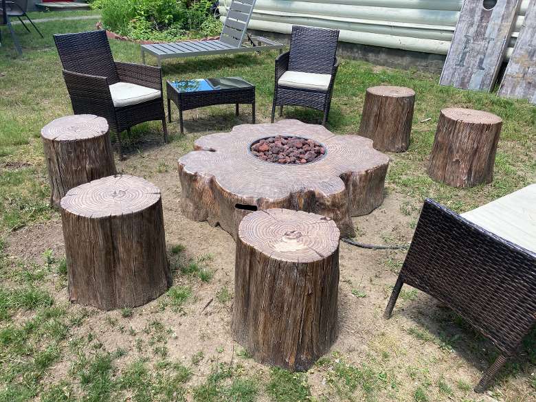 outdoor fire pit with stump shaped seating