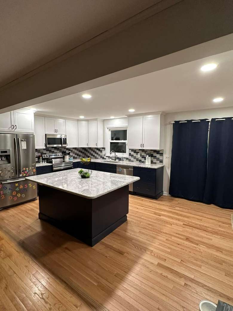kitchen with wooden floor and a center island