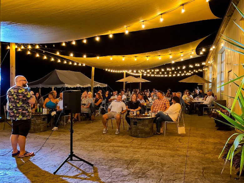 Live comedy show on outdoor terrace at Artisanal Brew Works restaurant in Saratoga Springs NY