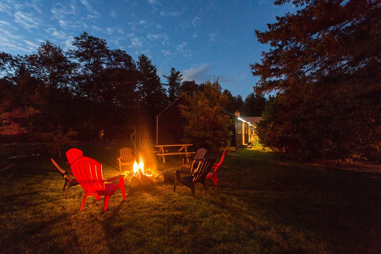 fire in fire pit outside at night
