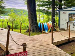 This is our private boardwalk, set back just behind the tree line for a rustic walk to our private dock. Handicap accessible with private parking!