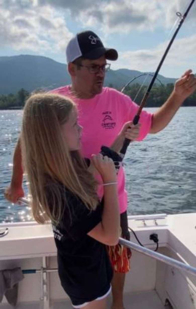 dad and daughter fish