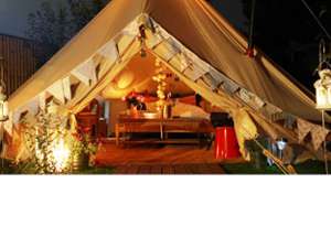 luxury tent with a king-sized bed inside