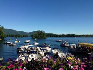 boats at a marina with a view of the lake in the background